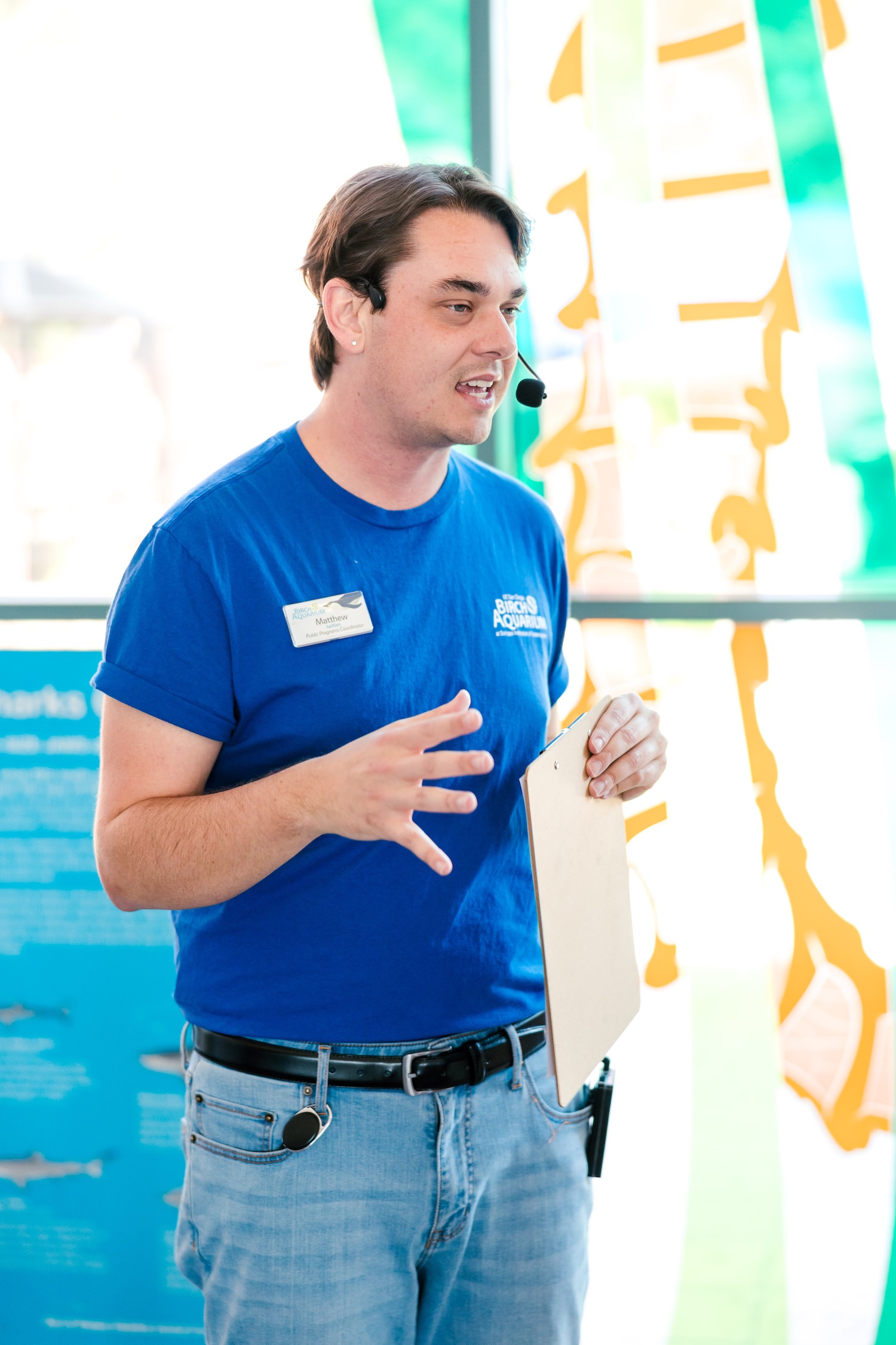 Matthew, Birch Aquarium staff member, speaking to the group