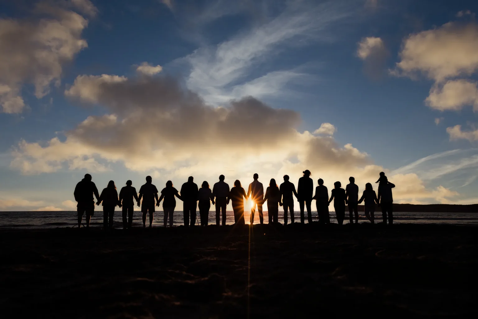 Extended family portrait on the beach by Amy Gray Photography