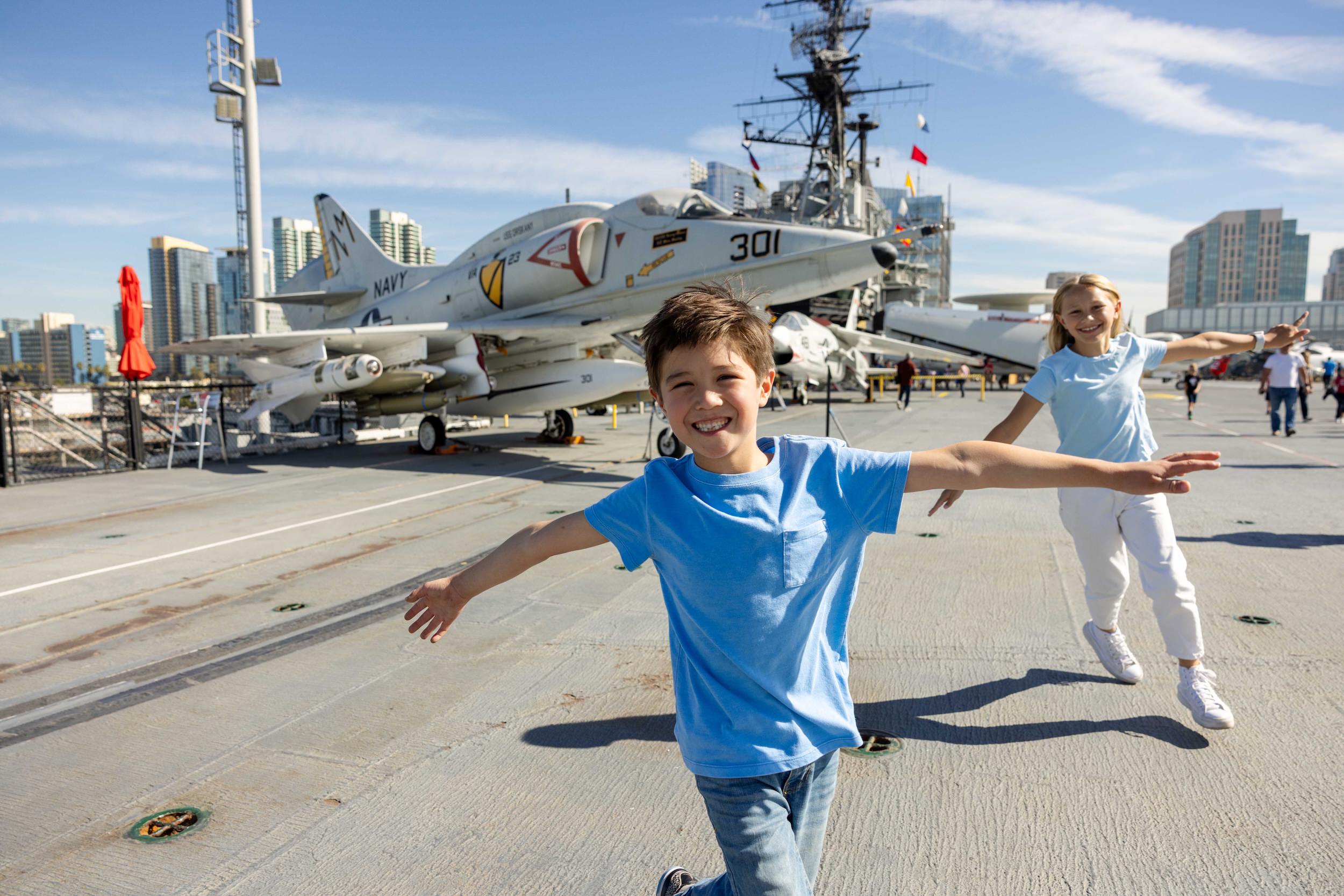 Kids exploring the USS Midway Museum flight deck