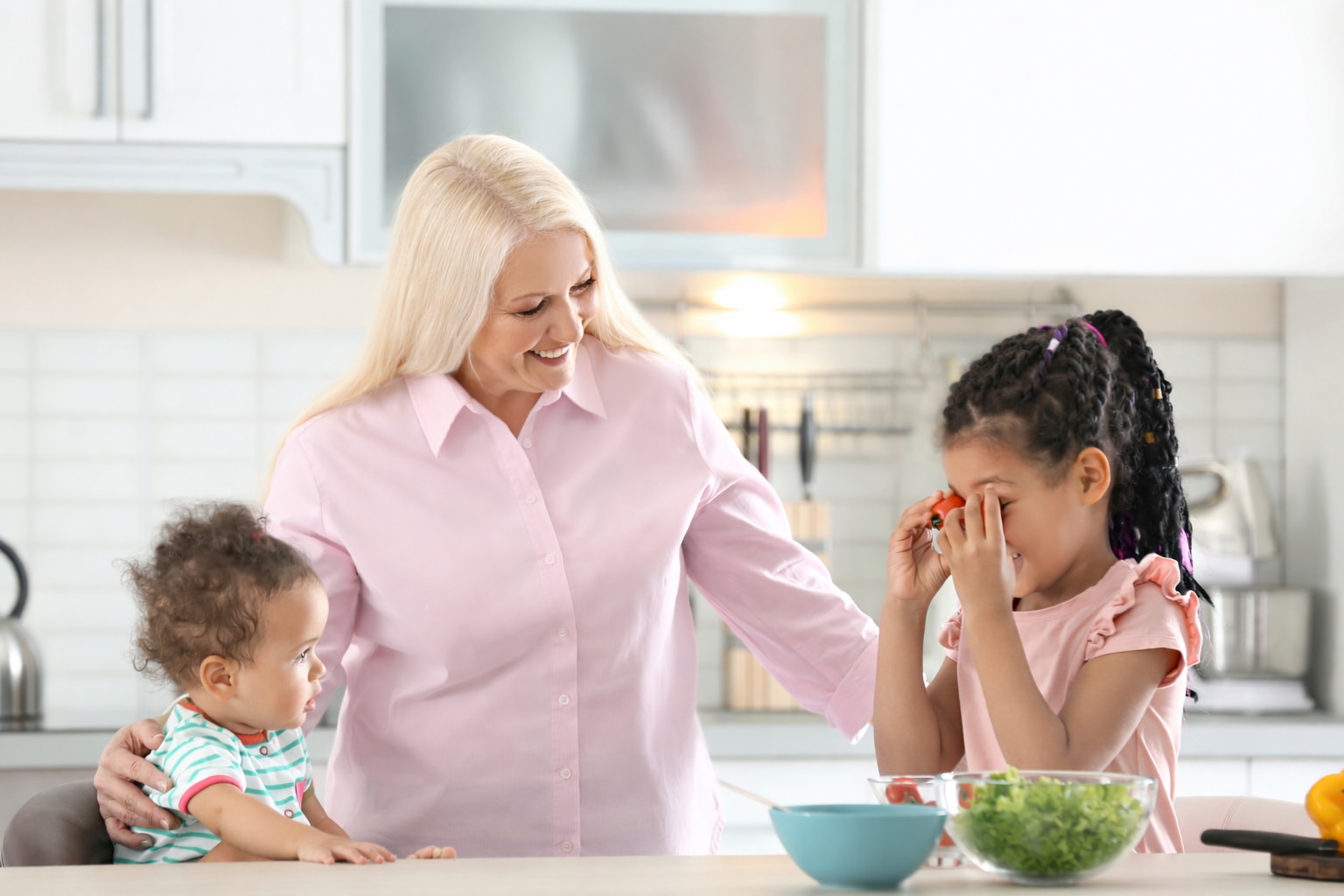 San Diego babysitter playing with children at a family home