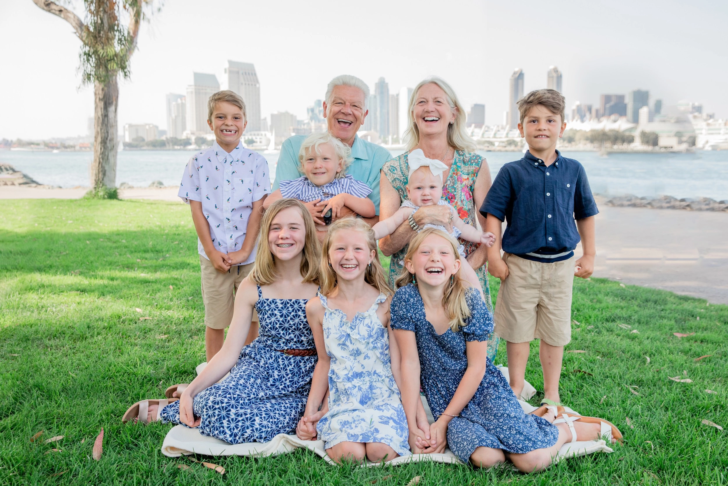Golden hour family portrait at Coronado Island Marriott Resort among tropical gardens