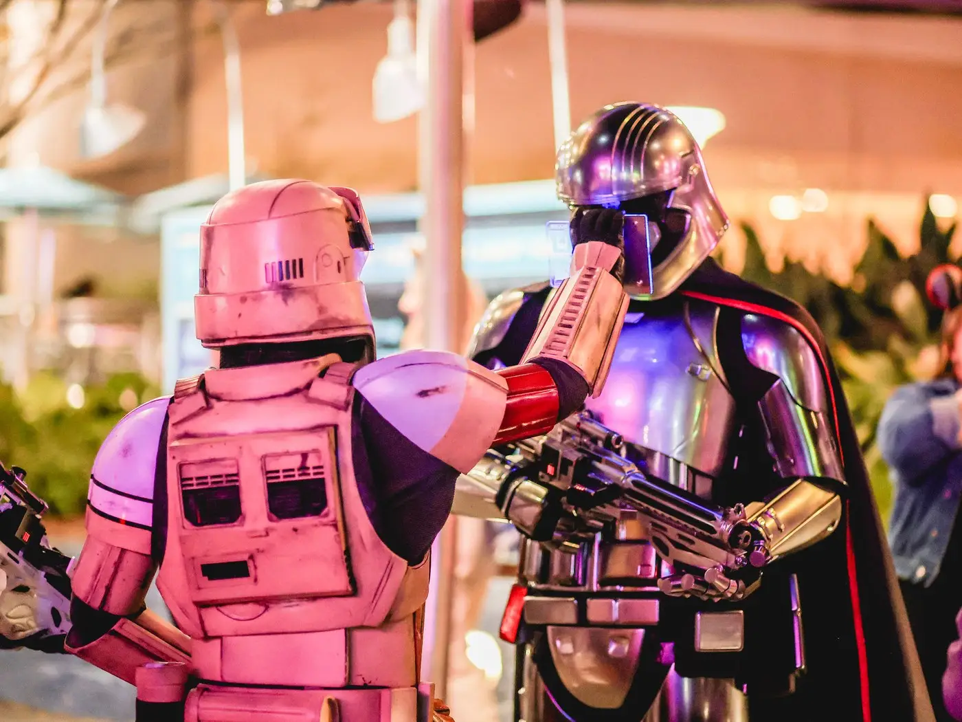 Detailed Star Wars cosplayers in costume at a fan convention